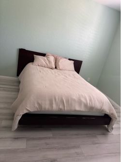 Dark wood queen size bed frame