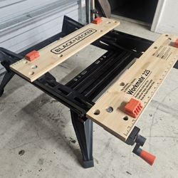 Black + Decker portable workbench and vise.
