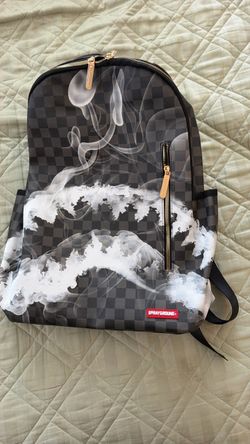 Spray ground backpack
