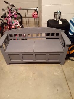 Used rustic-gray stained wood, indoor/outdoor, storage bench with new seat cushion featuring removable/washable green striped cover