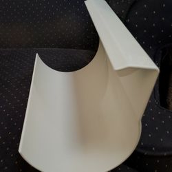 Wine Bottle Holder.  It Hooks on Refrigerator Shelf.  Doesn't  Fit in My New Refrigerator. 