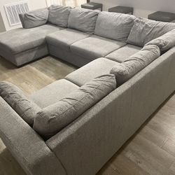 1  1/2 Year Old Storage Sleeper Sectional 