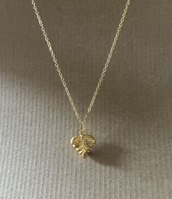 Gold color long necklace with pendant