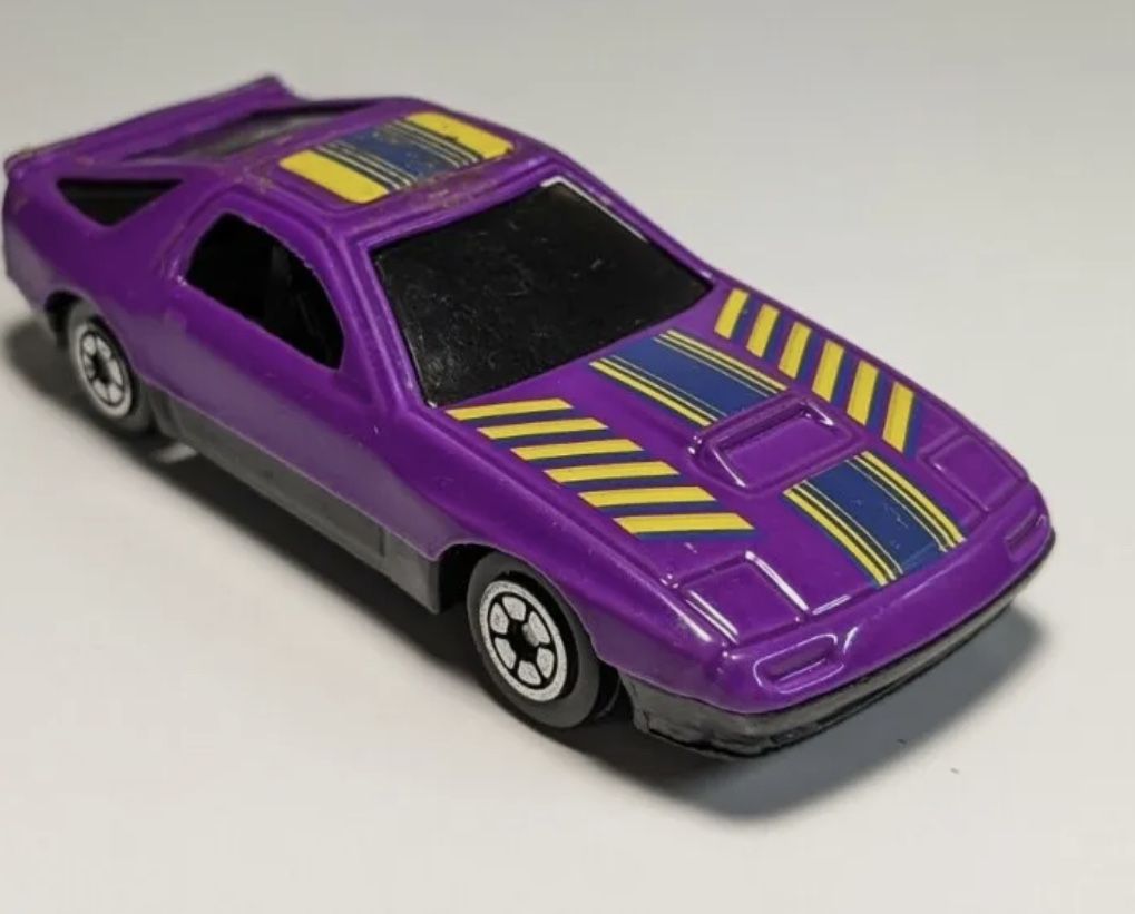 Here's a Vintage Yatming #807 Purple 2nd Gen Mazda