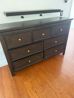 Wooden dark brown dresser