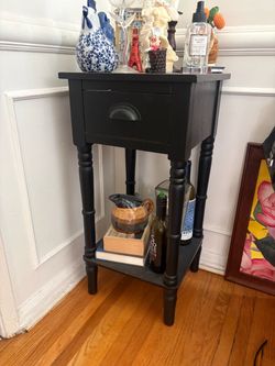 Black stand with drawer