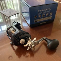 In the box.  Never been used before. Shimano, Tekota 600 HG LC Levelwind Line Counter Reel