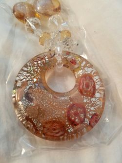 New necklace with glass pendant