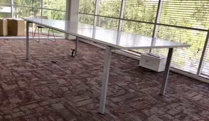 Modern 10 by 4 foot conference table.
