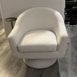 White bouclé swivel chair