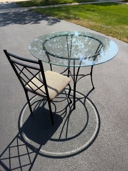 Round Glass Top Dining Table with 4 chairs