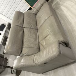Leather Power recliner love seat 