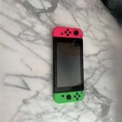 Nintendo switch(green and pink controllers)