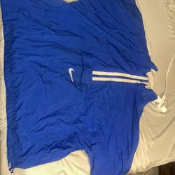 Blue Nike windbreaker 