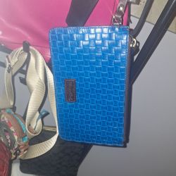 Brand New Authentic Dooney and Bourke Clutch 