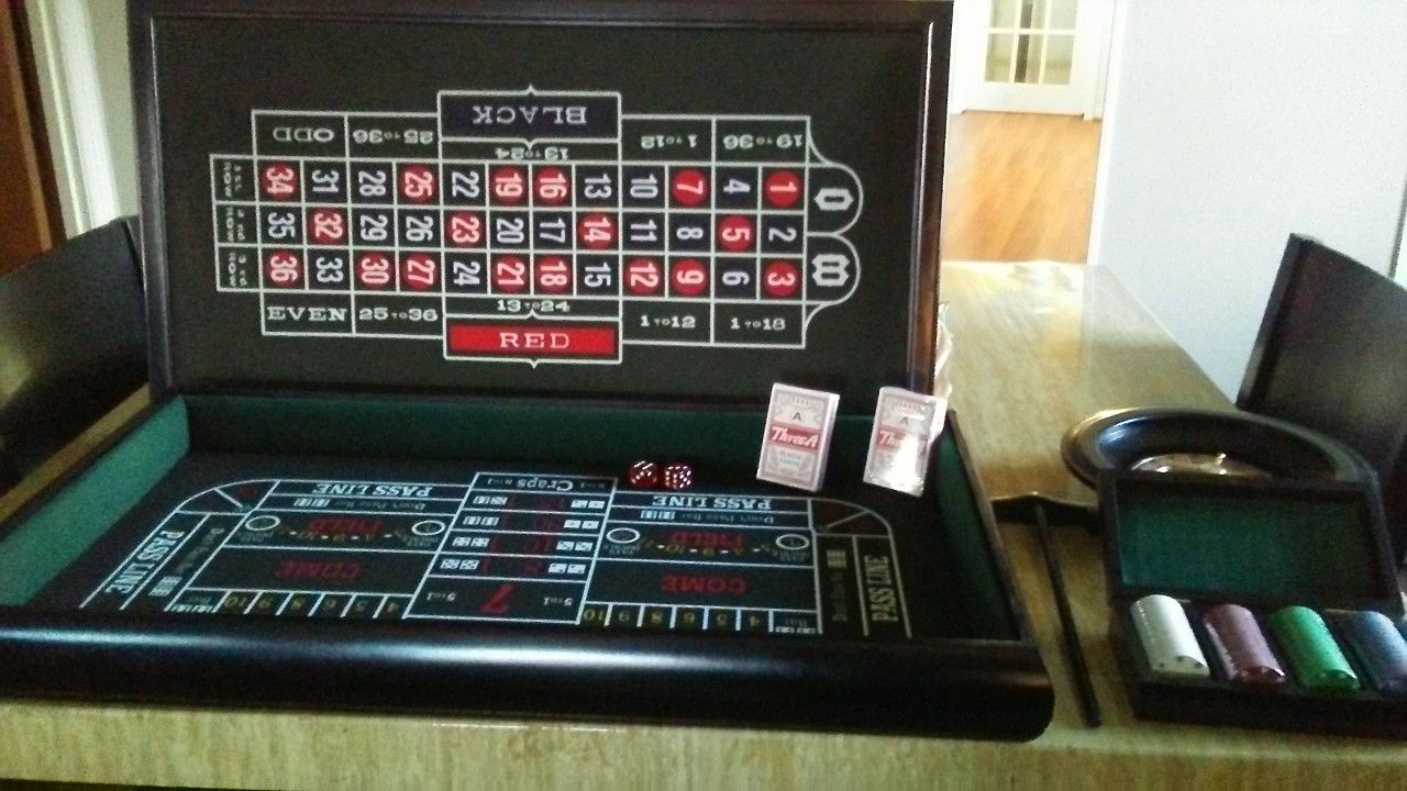 Casino games set. Wood case. Sealed chips and cards.