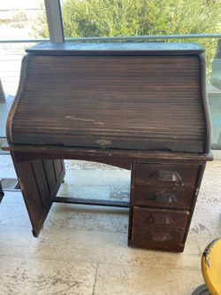 Antique roll top desk