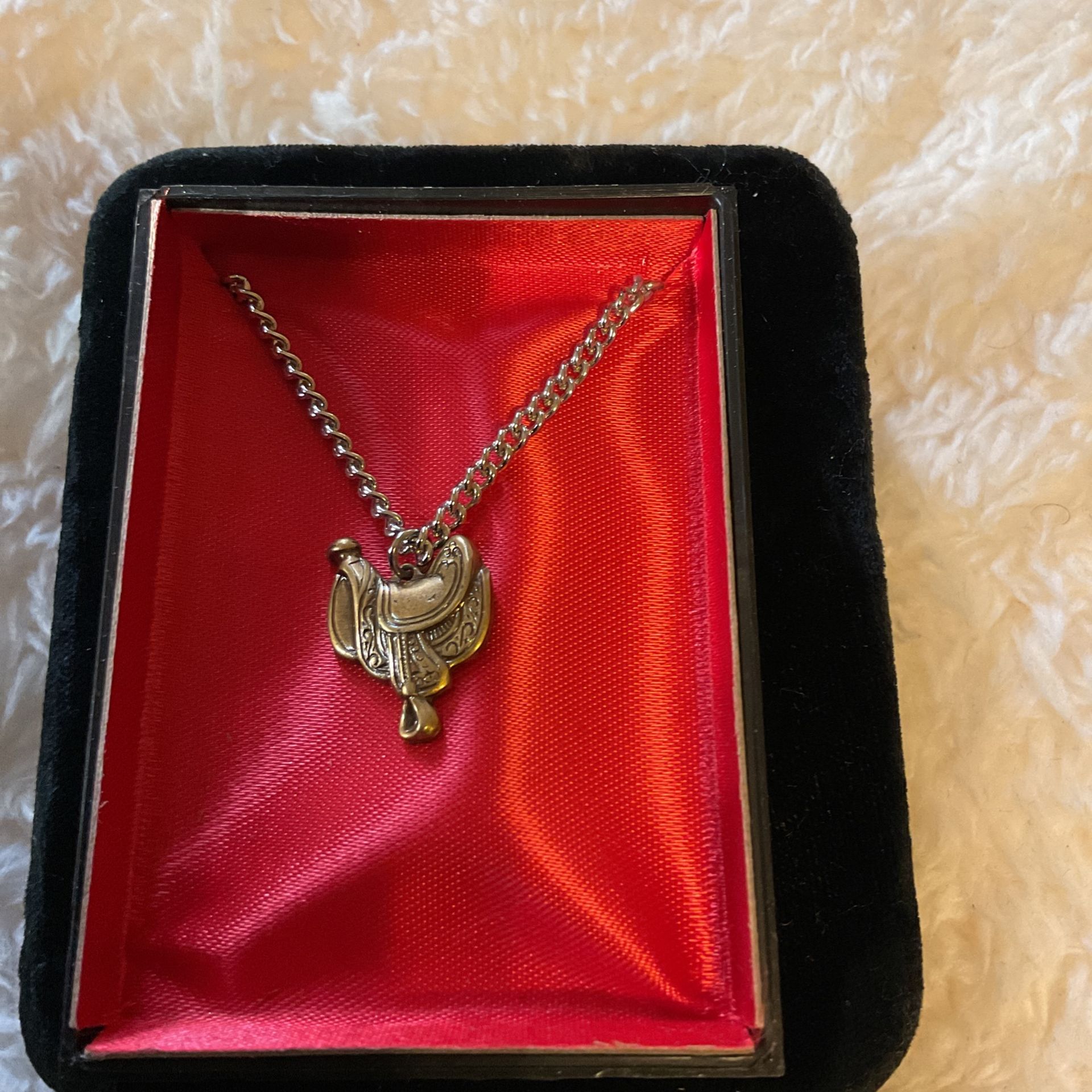 Silver Necklace With Horse Saddle Pendant