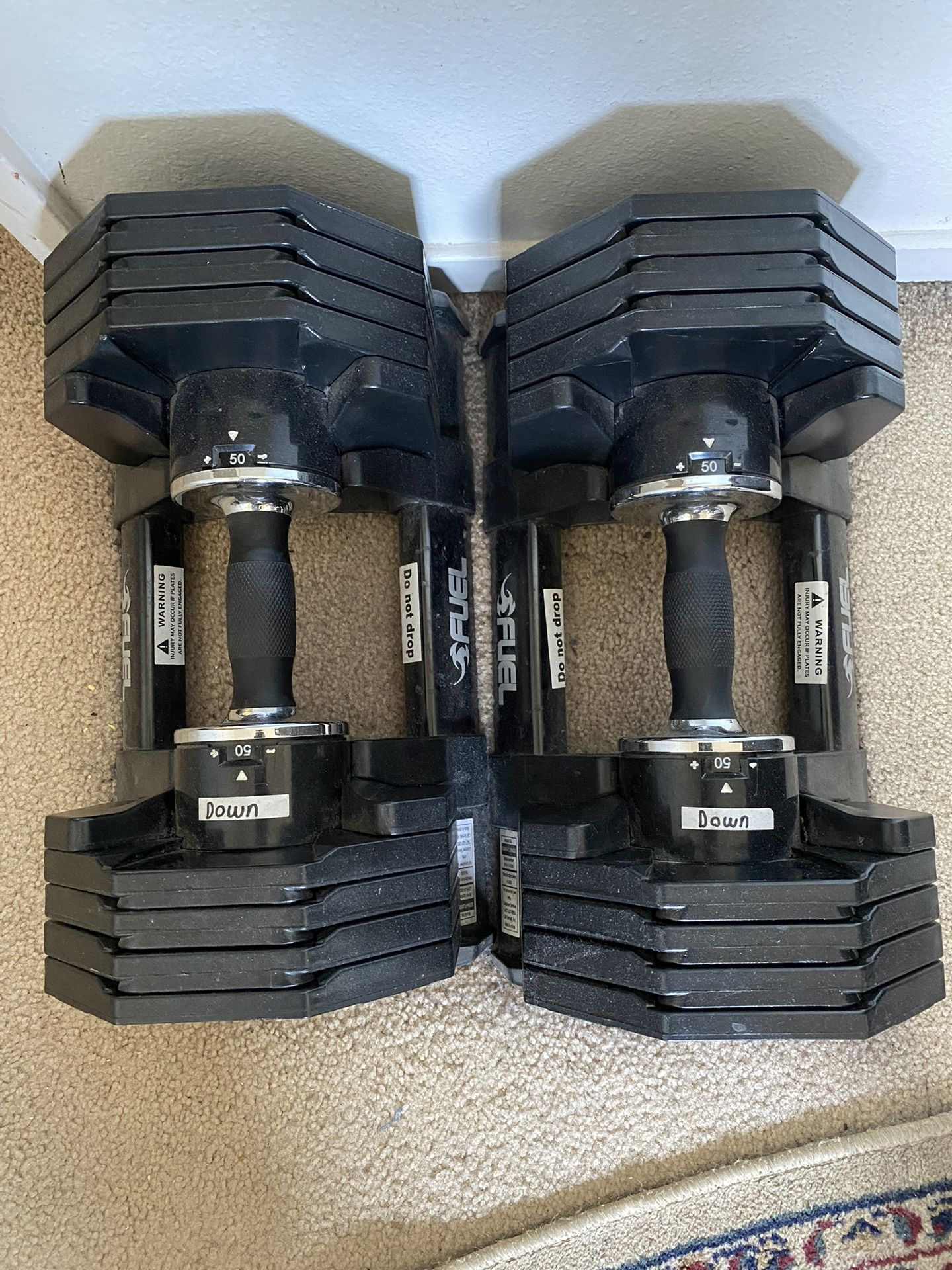 Fuel adjustable Dumbbells (5-50lbs)