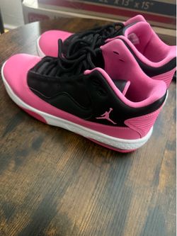 Pink and black Jordan’s