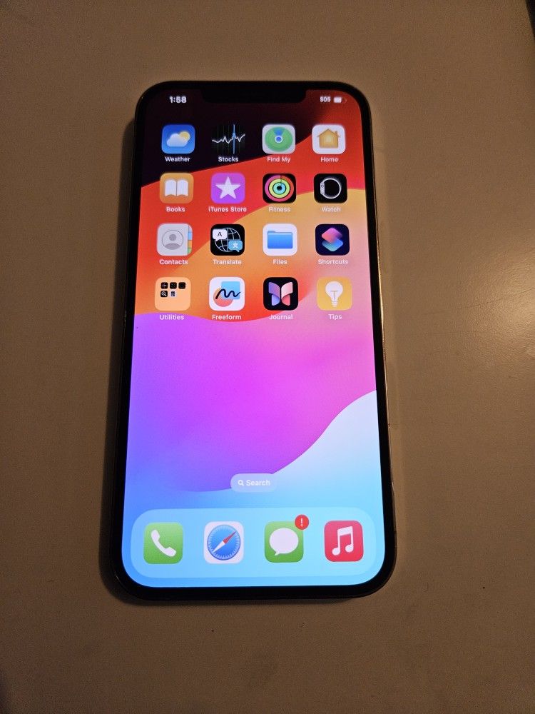 IPHONE 12 PRO MAX 256GB UNLOCKED (ONE CAMERA LENSE IS DIRTY)