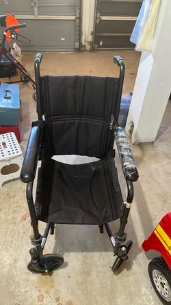Folding wheelchair