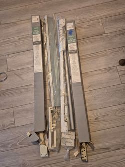 Four sets of drapery rods and Hardware