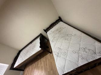 Twin bed with a mattress