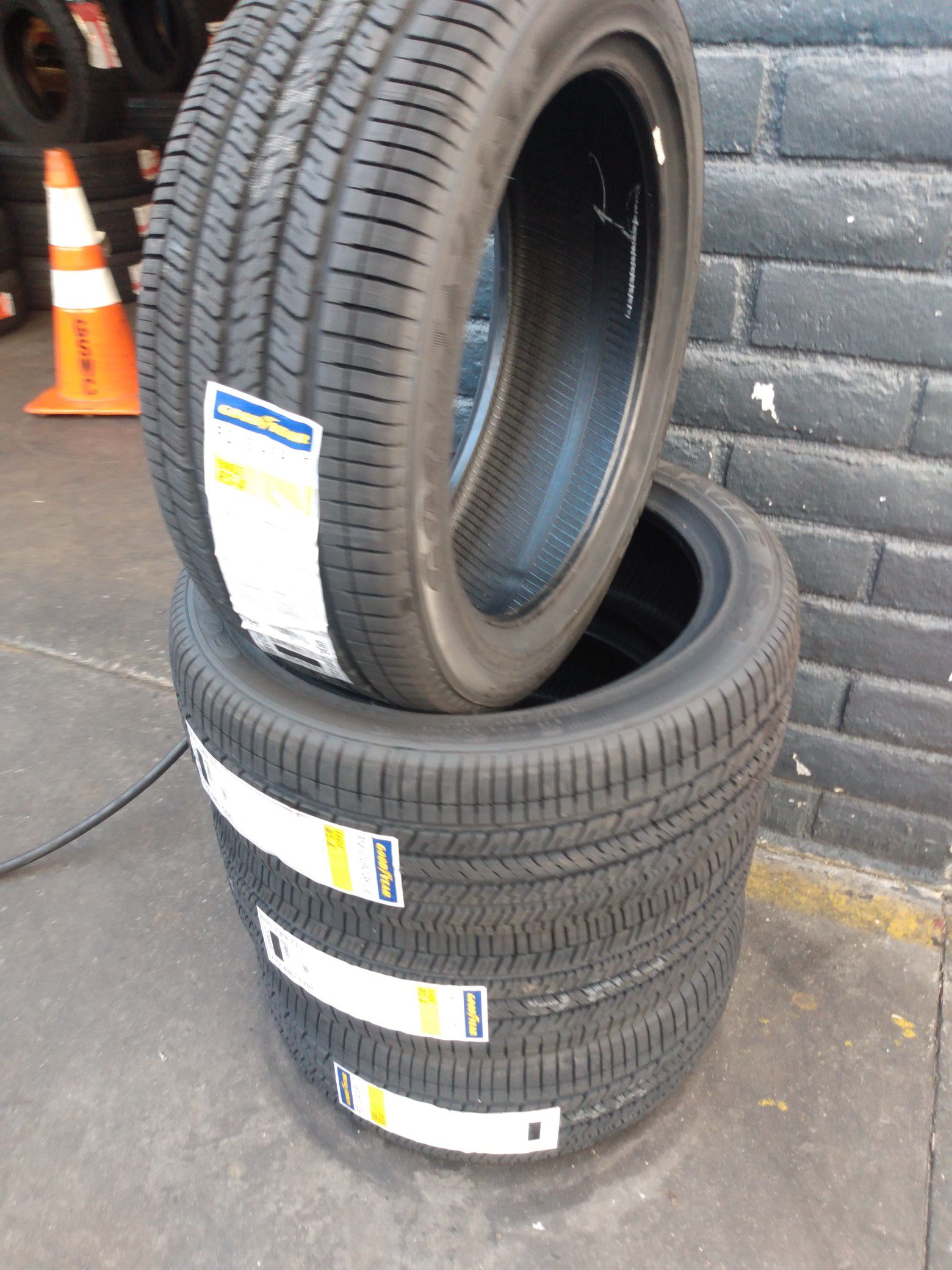 Set of new four tires Goodyear 215 45 17 free professional installation