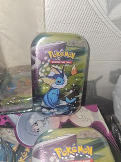 $35 Prismatic mini tin Vaporeon Pokemon TCG