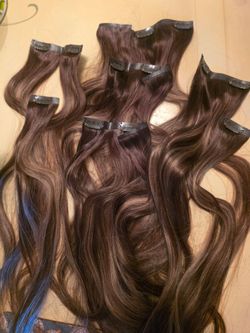 Clip in human hair extensions