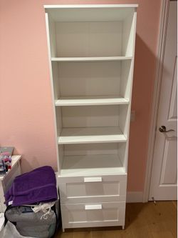 White bookcase with drawers