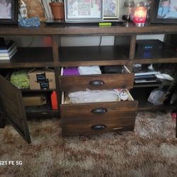 Solid wood entertainment/tv stand.
