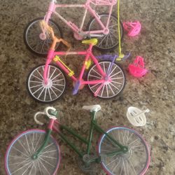 Vintage Barbie bike and helmet lot three of each