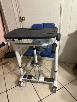 Blue and white patient transfer lift chair