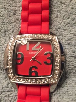 Geneva silver tone watch with diamond accents and red rubber band