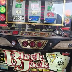 2 Slot Machines with play coins 