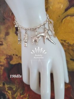 Sterling Silver 925 Bracelet with 8 beautiful charms as a good luck