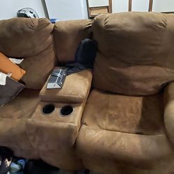 Two Brown Couch Both With Recliners