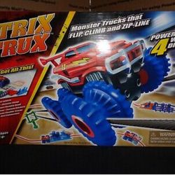 TRIX TRUX Monster Trucks That Flip, Climb And Zip-Line w/ Powerful 4 Wheel Drive *New In Box *