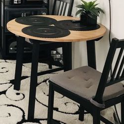 Table and  2 chairs 
