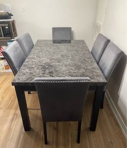 Modern Black Marble Dining table set with 6 cushion chairs