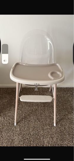Baby eating  high chair