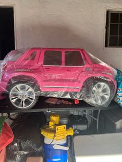 Pink power wheels Escalade