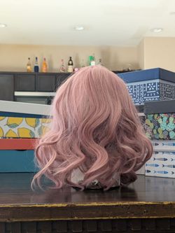 Shoulder length pink curly wig
