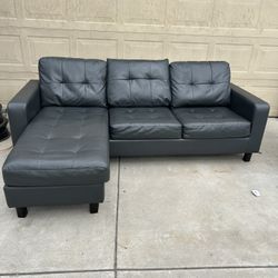black faux leather sectional sofa