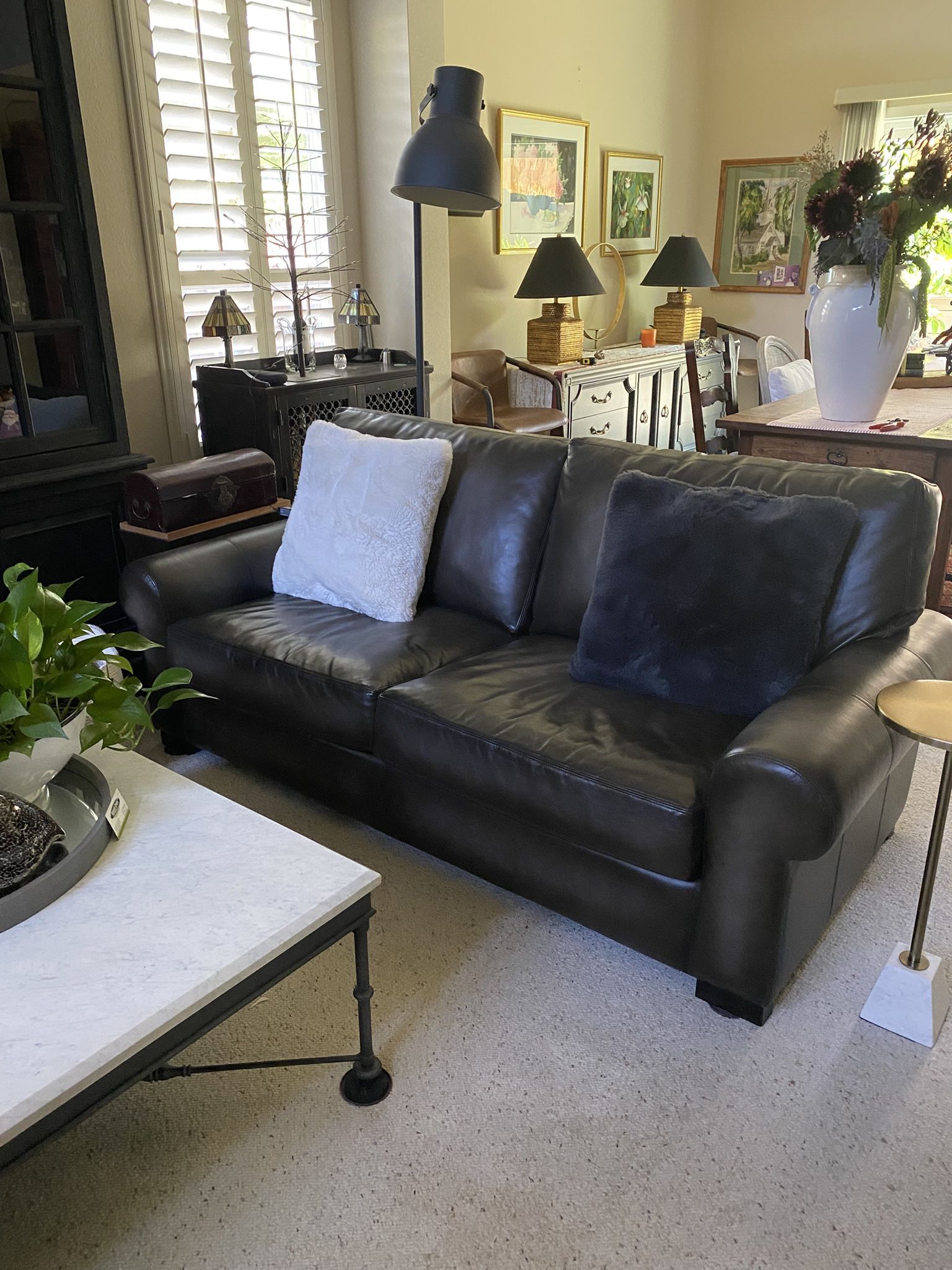 Pottery barn, black leather loveseat $300