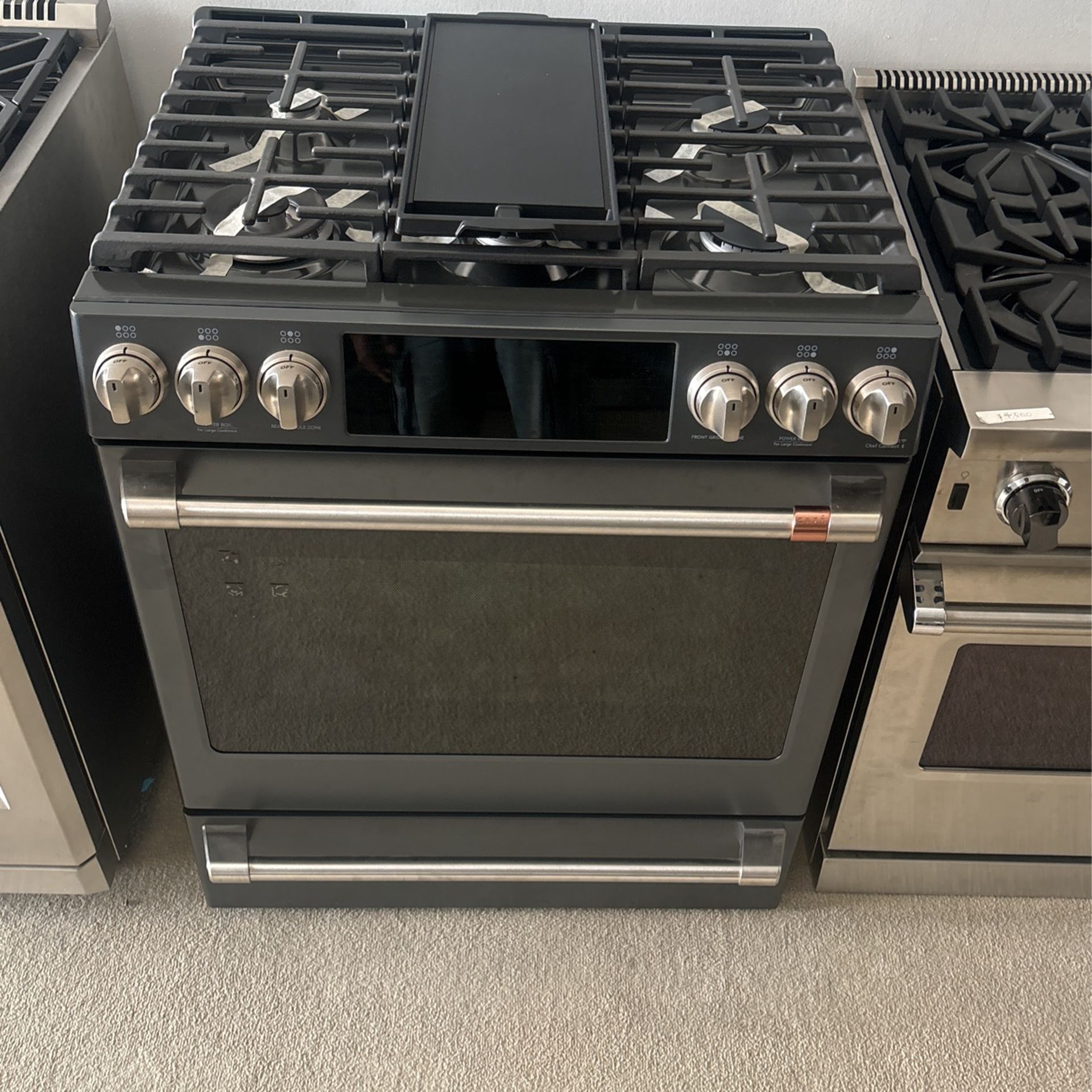 Café – 30” 5.6 Cu. Ft. Self Cleaning Slide In Gas...