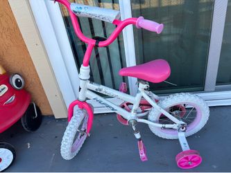Huffy sea star bike with training wheels