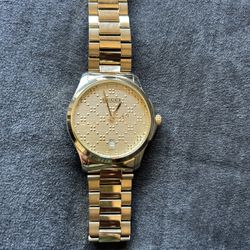 Gold Gucci Watch 